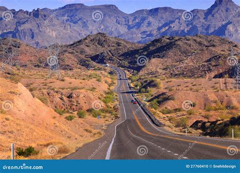 Road Through Rugged Terrain Stock Photo - Image: 27760410