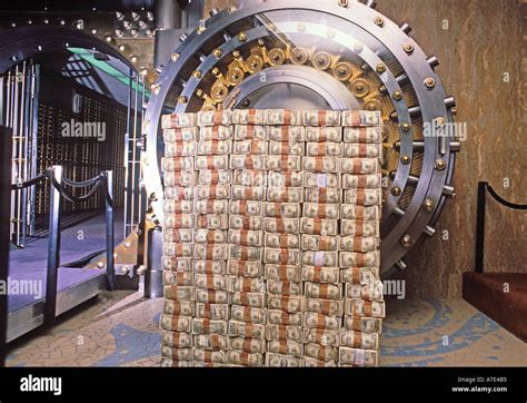 money stacked in front of a bank vault Stock Photo: 1696948 - Alamy