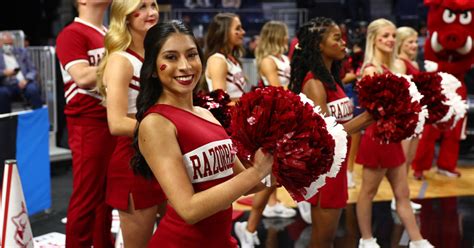 WATCH: Arkansas cheerleaders retrieve basketball after it gets stuck