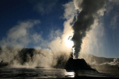 Photo of Steam Phase eruption of Castle geyser with shadows