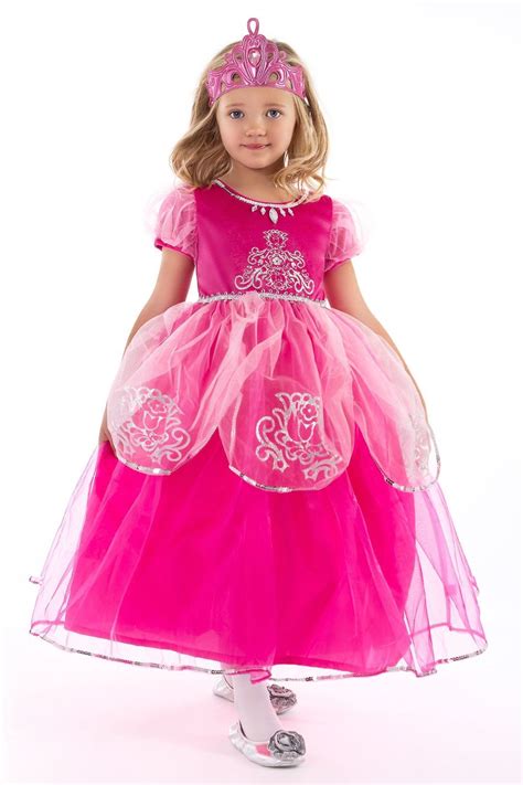 This elegant pink princess dress is embellished with silver trims and accents. The bodice is ...