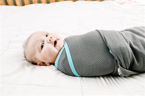 How To Swaddle A Baby With Arms Down at homererobertson blog