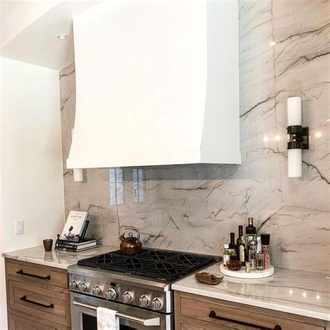 Stone Interiors on Instagram: “Swooning over this full-height quartzite backsplash! We love ...