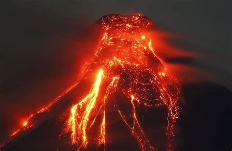 Albay, Philippines The Mayon volcano near Legazpi city spews molten lava during an eruption ...