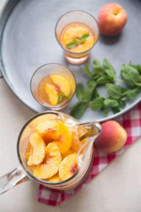 Peachy Bourbon Slush Punch - LemonsforLulu.com