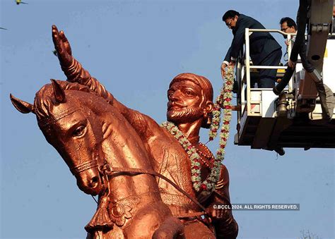 A statue of Shivaji Maharaj at Cotton market square in Nagpur ...