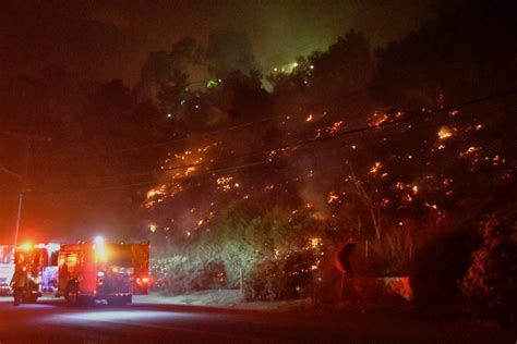 New Fast-moving Los Angeles wildfire destroys homes, prompts evacuation ...