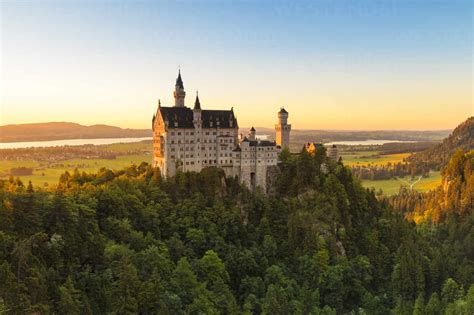 Neuschwanstein Castle at sunset, view to Forggensee Lake, Schwangau, Allgau, Schwaben, Bavaria ...