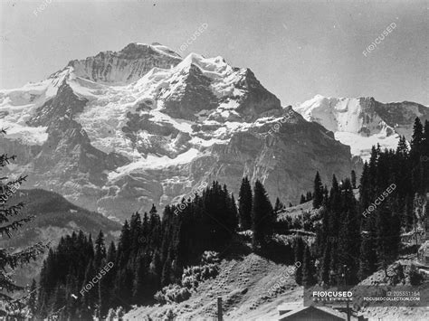 Panorama in black and white of gorgeous mountain range with peak covered in snow, Belgium. — sky ...