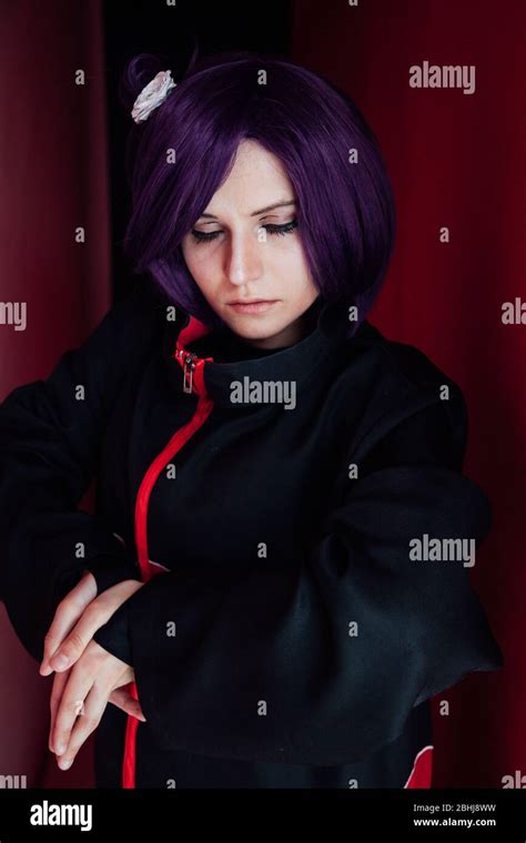 woman anime cosplayer with purple japan hair Stock Photo - Alamy