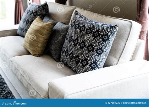 Set Pillows on white Sofa stock image. Image of light - 127581235