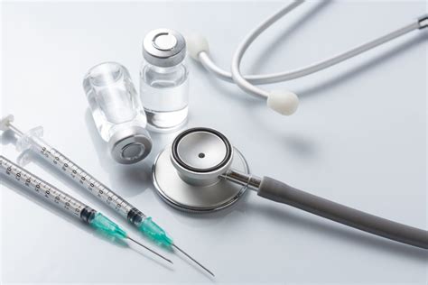 Medical equipment : stethoscope ampoules and syringe on white ba | Vegas Valley Vein Institute