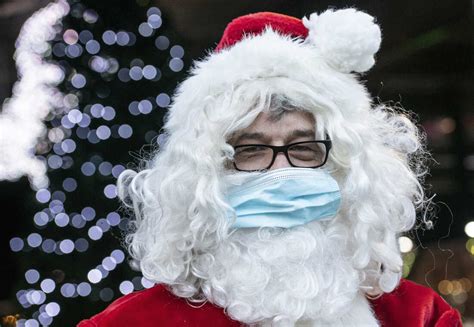 Coronavirus FAQ: Is it OK for the kids to take a pic with Santa? : Goats and Soda : NPR