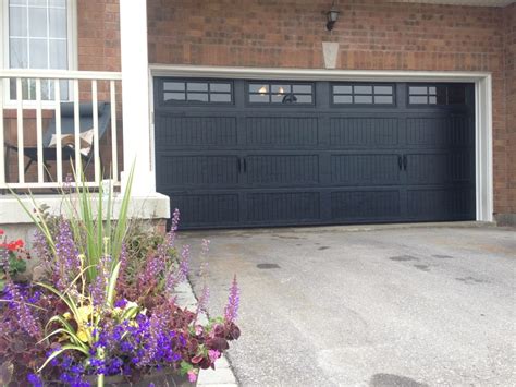 Black Garage Doors With Windows — Randolph Indoor and Outdoor Design