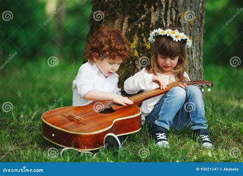 Cute Little Children Playing Guitar Stock Image - Image of children ...