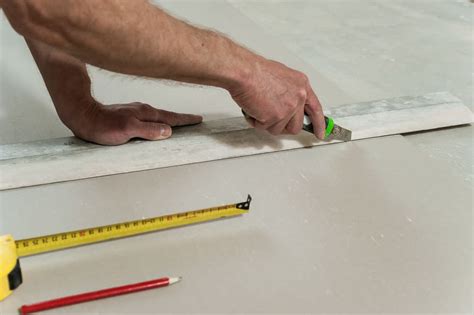 How to Cut Drywall: Using a Utility Knife