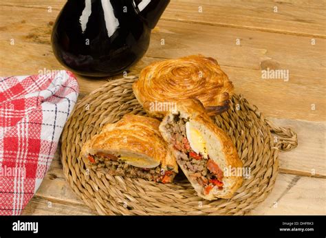 Traditional Spanish meat pie with red wine Stock Photo - Alamy