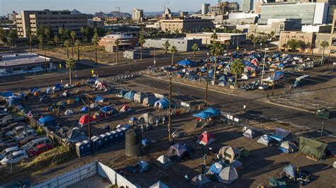 Fire burns tents at homeless encampment in downtown Phoenix