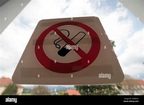 smoking ban or smoking prohibited sign with pictogram of a filter ...