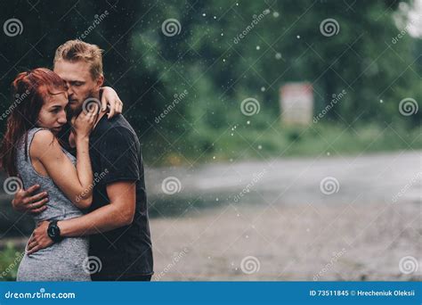 Beautiful Couple Hugging in the Rain Stock Image - Image of smile, activity: 73511845