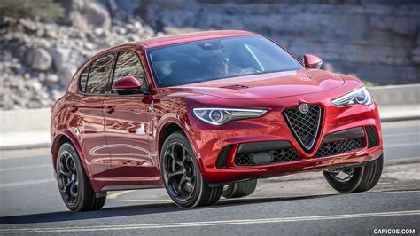 2018 Alfa Romeo Stelvio Quadrifoglio (Color: Rosso Competizione) - Front Three-Quarter | Caricos