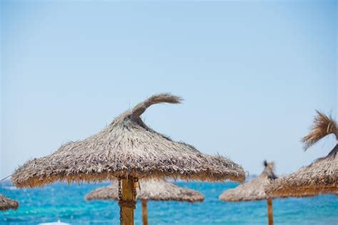 Premium Photo | Sun umbrella at tropical beach