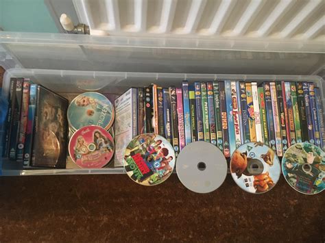 60+DVD’s Disney/Pixar collection includes box also extra dvd’s in ...