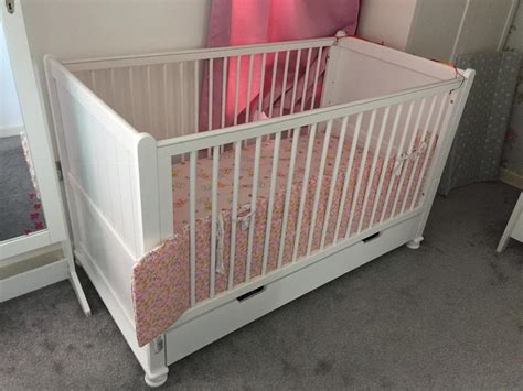 Solid wood baby cot bed + mattress | in Stretford, Manchester | Gumtree