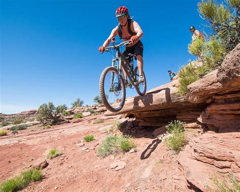 Mountain biking the Porcupine Rim Trail near Moab Photograph by Elijah Weber - Fine Art America