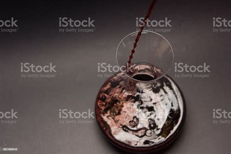 Decanting Red Wine Stock Photo - Download Image Now - Alcohol - Drink, Black Background, Black ...