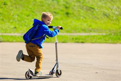 274 Happy Little Boy Enjoy Riding Scooter Summer Stock Photos - Free & Royalty-Free Stock Photos ...