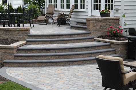 Multi Level Patio with walls and bull nose Pavers using Techo Bloc Designed and installed by R&R ...