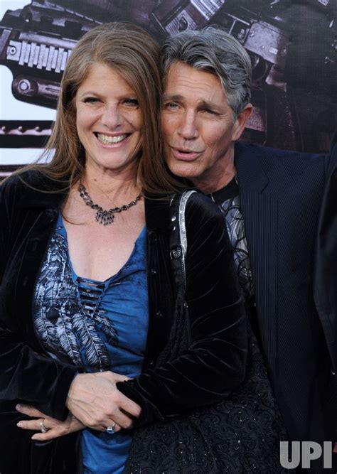 Photo: Eric Roberts arrives with his wife Eliza Roberts at "The Expendables" premiere in Los ...