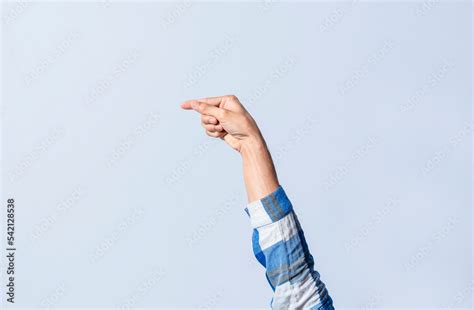 Hand gesturing the letter G in sign language on an isolated background ...