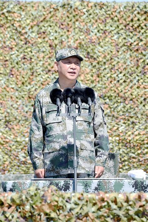 China Focus: Xi reviews parade in field for first time - Xinhua ...