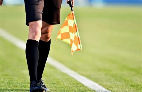 Why Are Linesman Flags Different Colors? | Sports Definitions