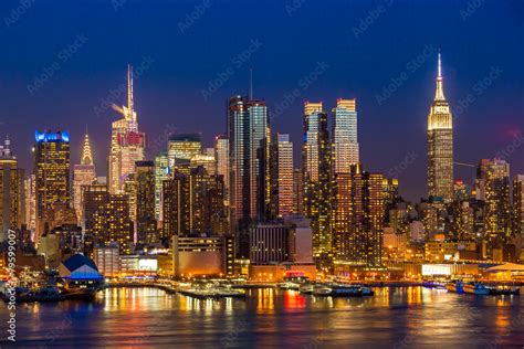 New York City Manhattan midtown buildings skyline night Stock Photo | Adobe Stock