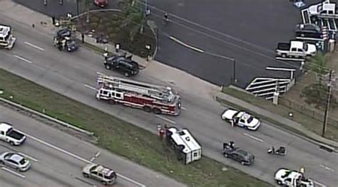 USPS truck collides with car, flips over in SE Houston | khou.com