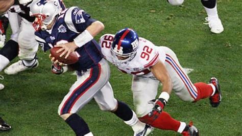 Michael Strahan sacks Tom Brady in Super Bowl XLII