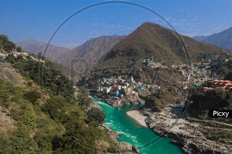 Image of The confluence of Alaknanda and Bhagirathi rivers, which is officially accepted as the ...