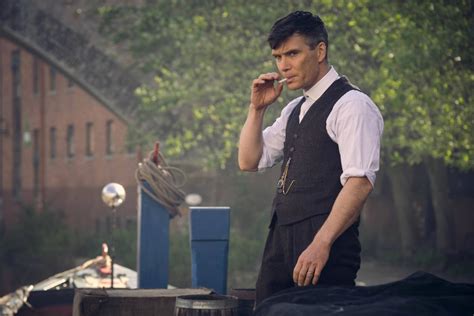 Download Thomas Shelby Smoking Wallpaper | Wallpapers.com