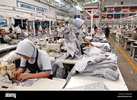 Sukoharjo, Indonesia. 15th Mar, 2018. Workers sewing Malaysian Navy uniforms on the production ...