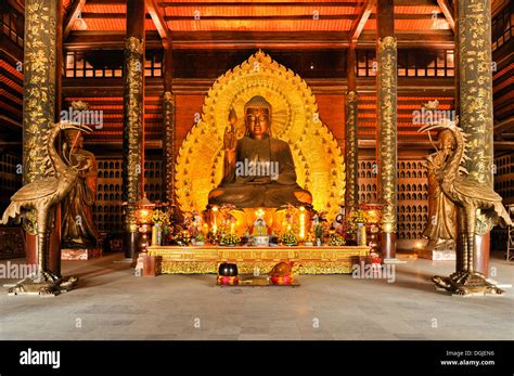 Golden Buddha statue at the construction site of the Chua Bai Dinh pagoda, one of the largest ...