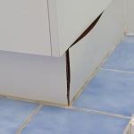 Should You Tile Under Bathroom Vanities or Kitchen Cabinets? | Renovate Australia