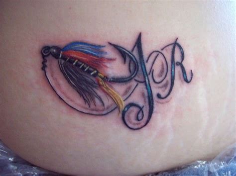 i like this one, but id want different colors :) | Flying tattoo, Hook tattoos, Fly fishing tattoo