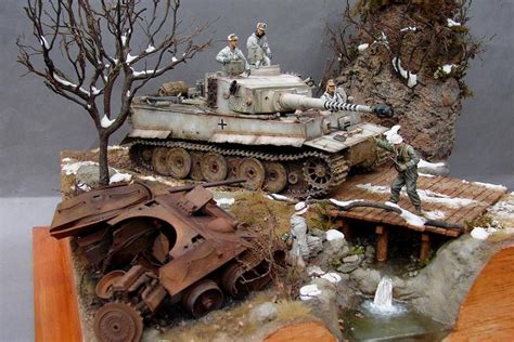 German Tiger tank passes by a burned Russian T-34. | Military diorama ...