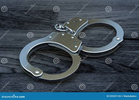 Police Metal Handcuffs on Dark Wooden Background. Stock Illustration - Illustration of detention ...