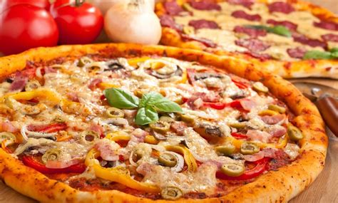 $4 Off Pizza and Soda - Piza Pizza & Subs | Groupon