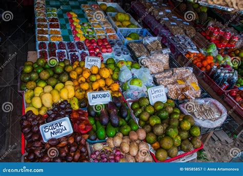 The Traditional Asian Market with Food. Sale a Variety of Fruits Lying on the Counter. Malaysia ...