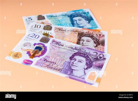 New plastic polymer British, English pound notes, £20, £10, £5 Stock ...